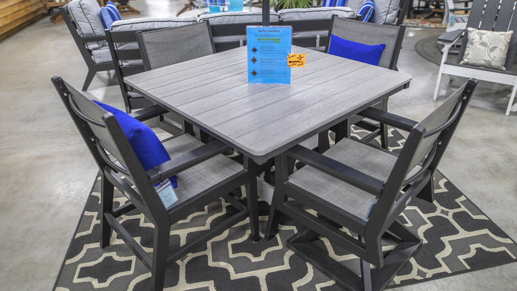 4 person square poly dining table and chairs in wood texture. champaign il store