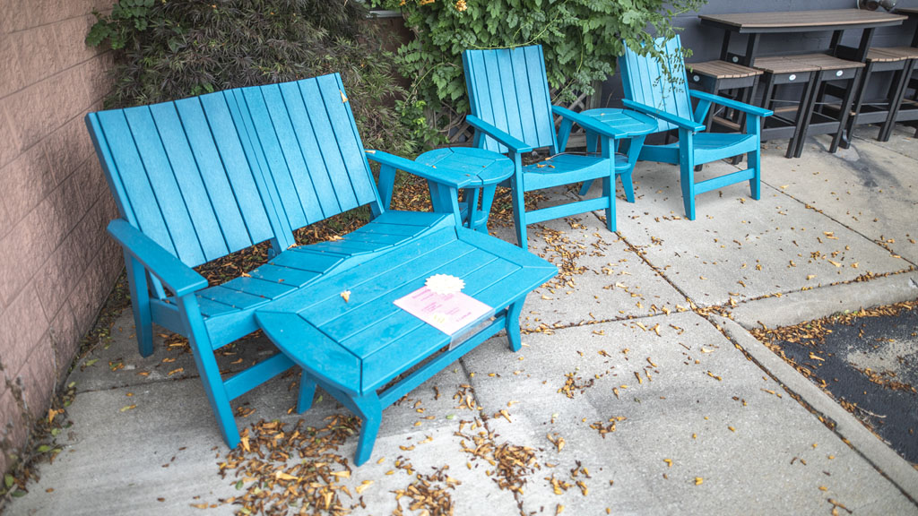 big heavy poly seating with side tables and coffee table in colorful texture. champaign il store